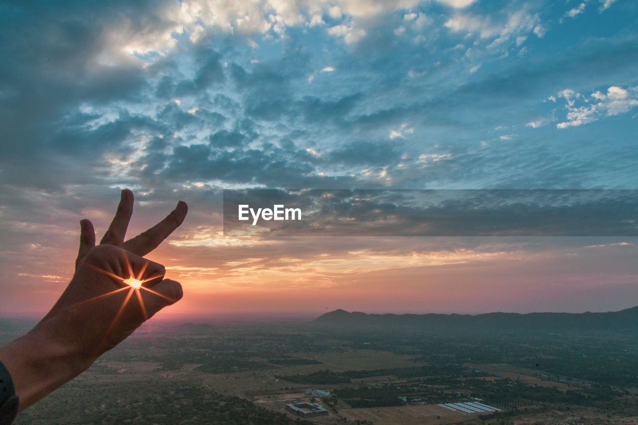 Sun star with evening landscape