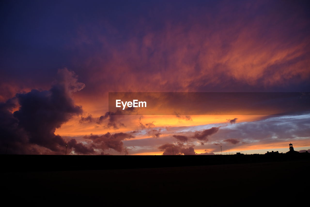 SILHOUETTE LANDSCAPE AT SUNSET