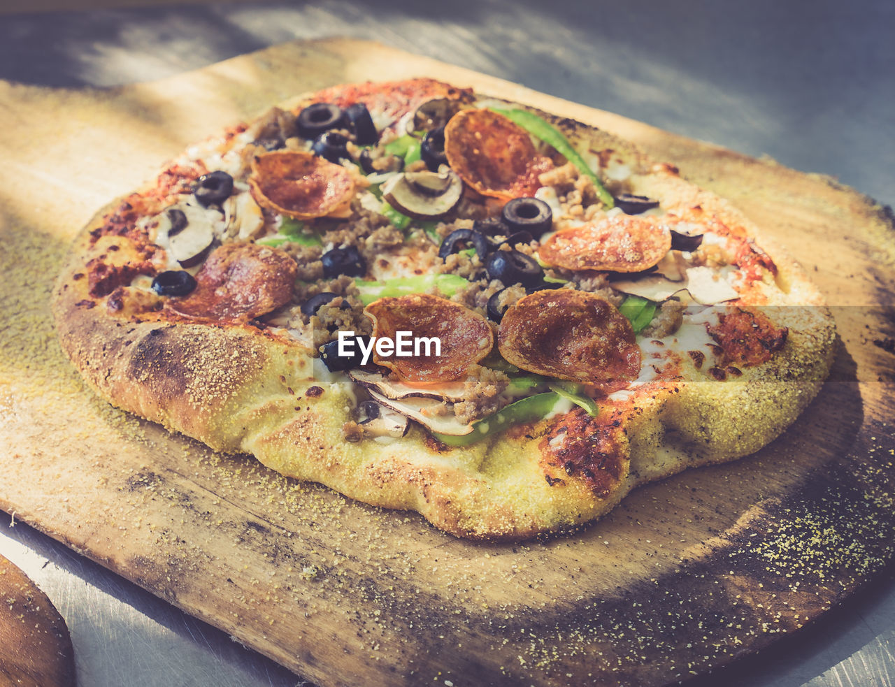 Close-up of pizza on cutting board