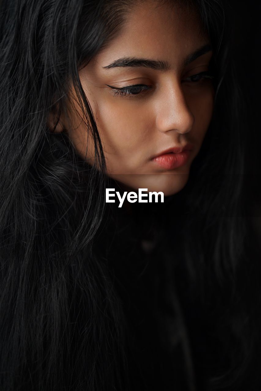 Close-up portrait of young woman