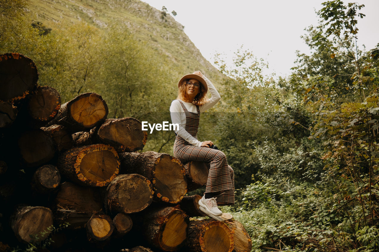 Portrait of young woman in forest