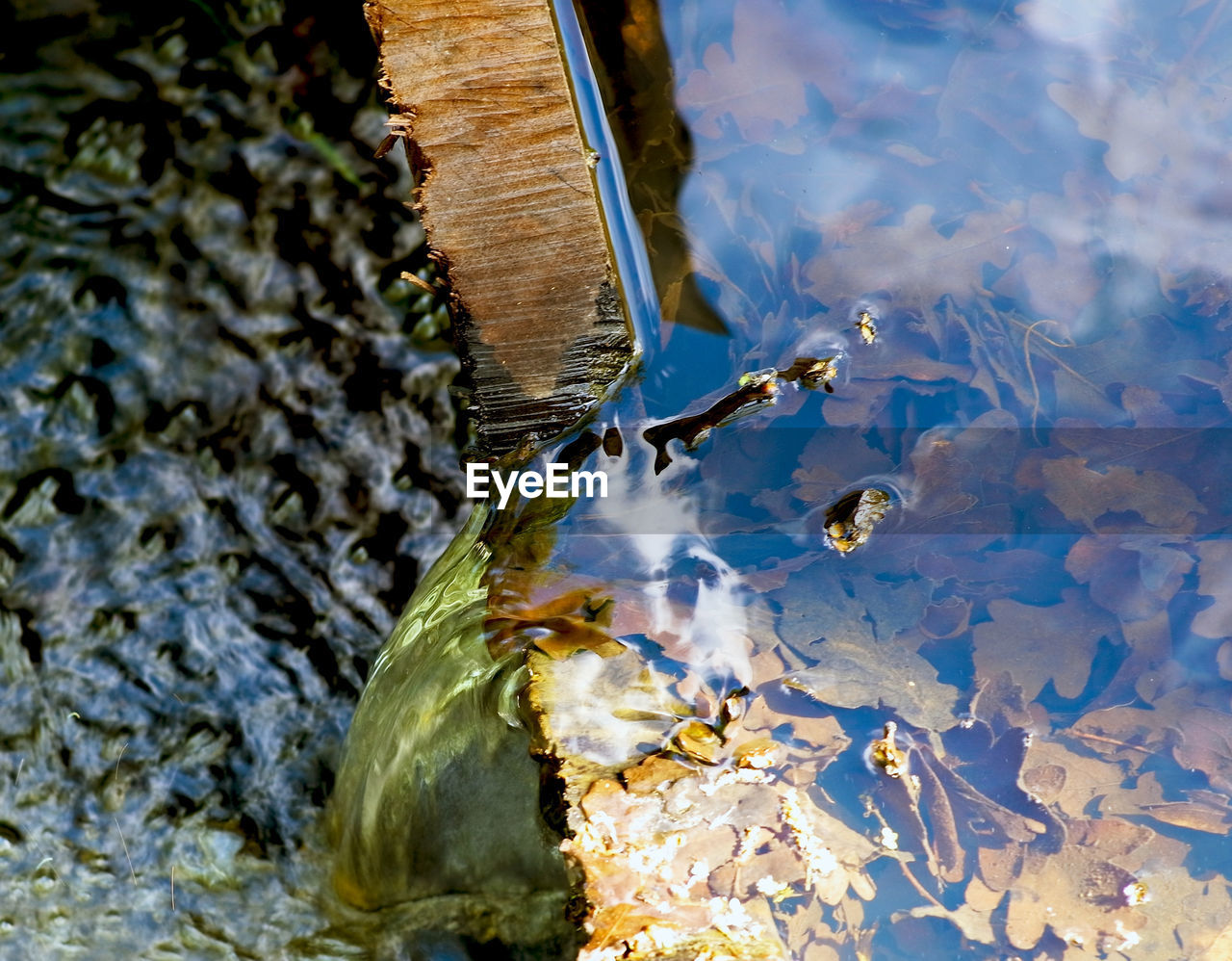 High angle view of water flowing from lake