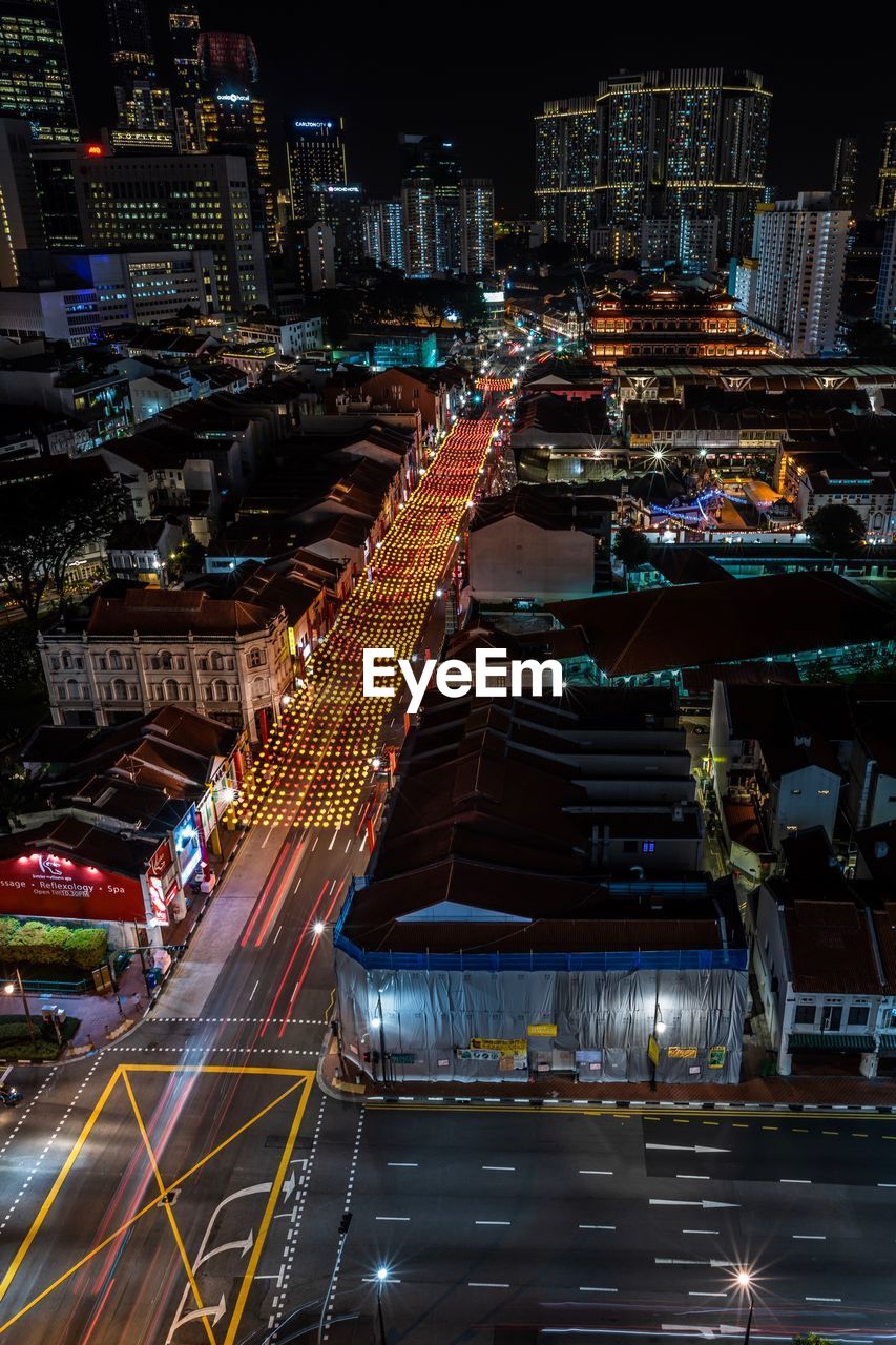 High angle view of illuminated buildings at night