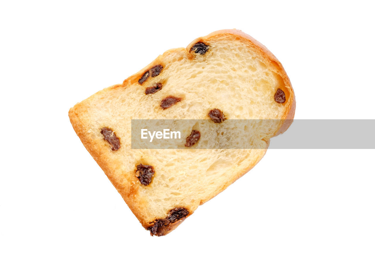 CLOSE-UP OF CAKE ON WHITE BACKGROUND