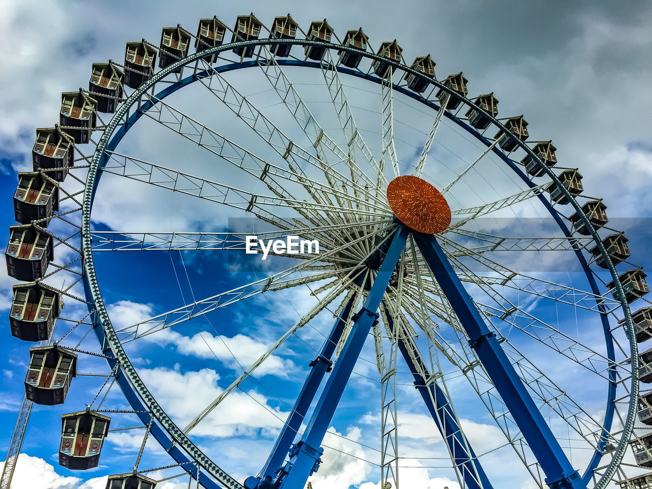 LOW ANGLE VIEW FERRIS WHEEL AGAINST SKY