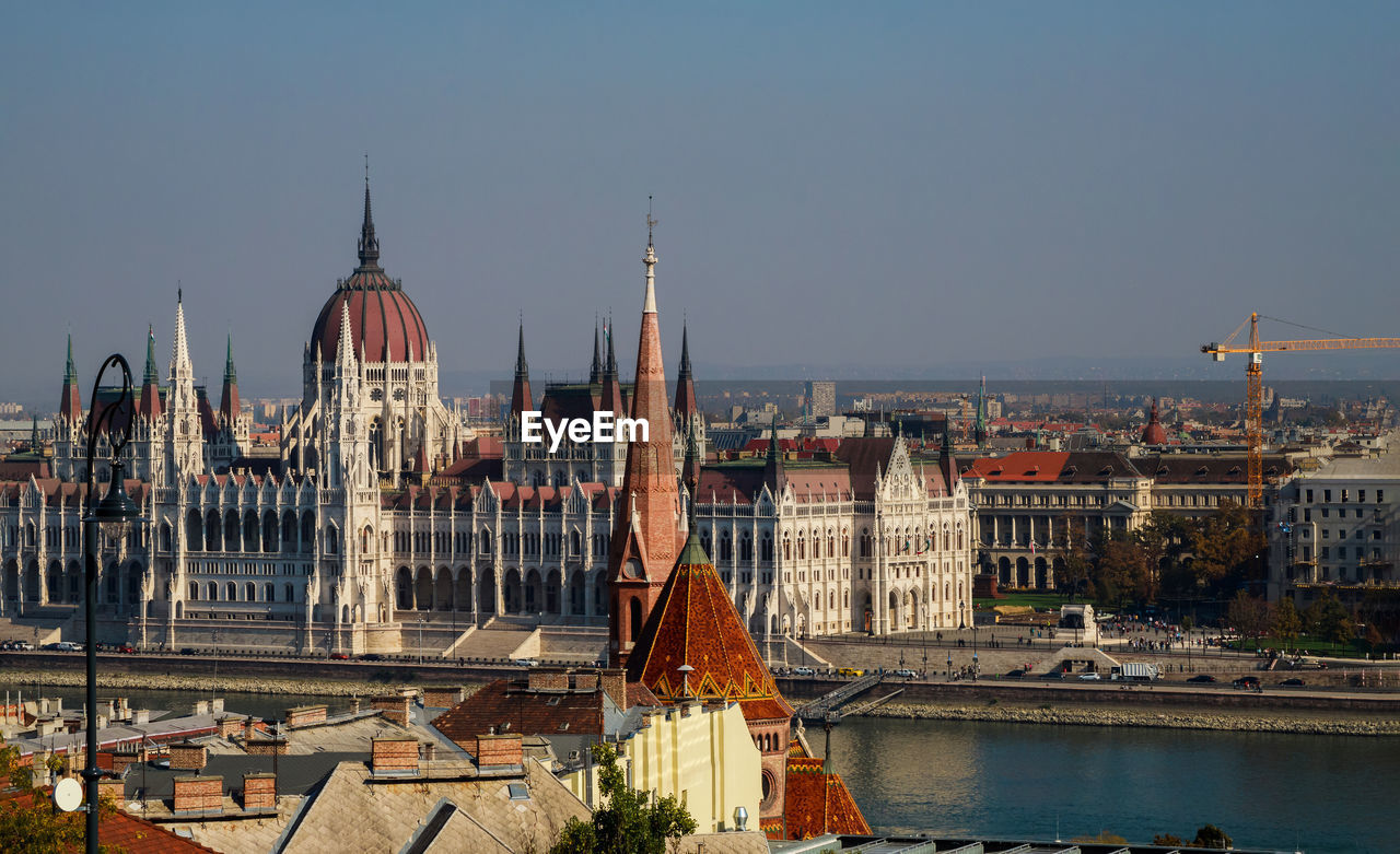 PANORAMIC VIEW OF BUILDINGS AGAINST SKY