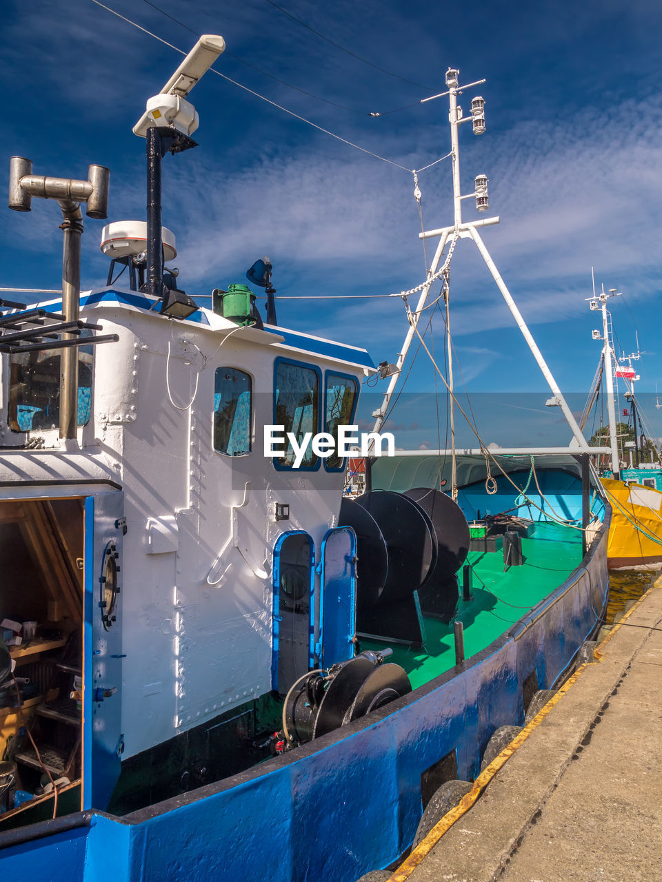 Cutters berthed at the harbour