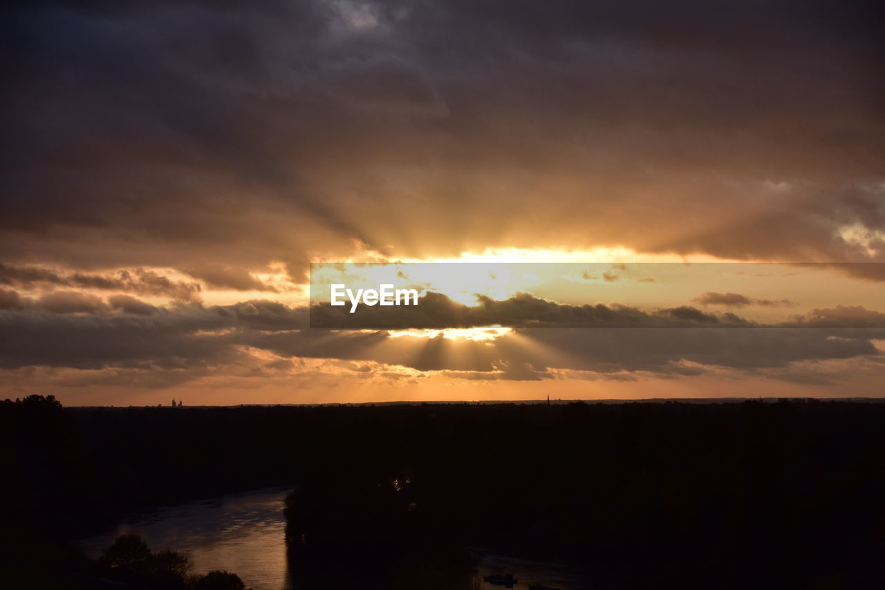 SCENIC VIEW OF LAKE AGAINST ROMANTIC SKY