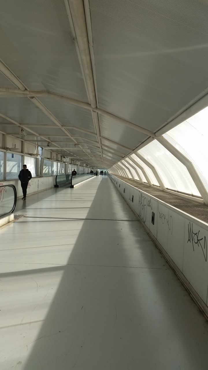 MAN MOVING ON RAILROAD STATION