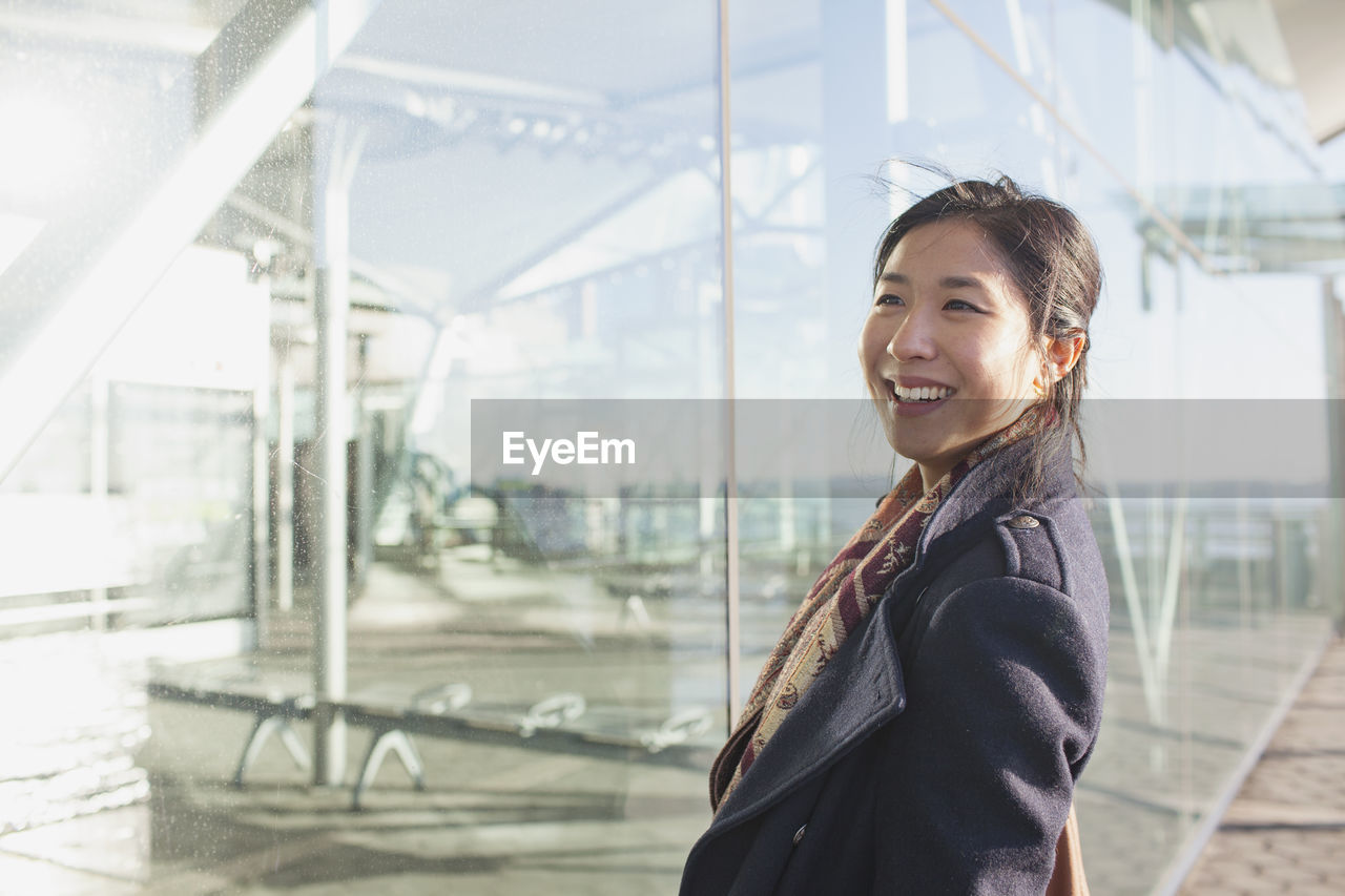 Young asian businesswoman in urban environment