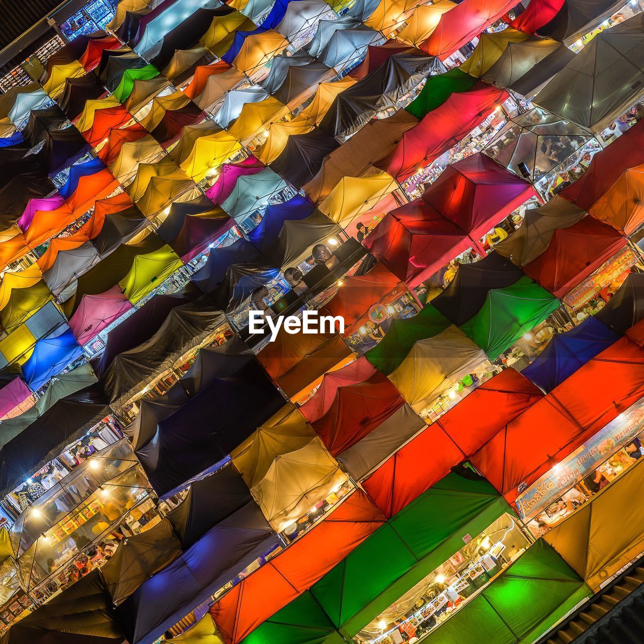 High angle view of illuminated colorful tents