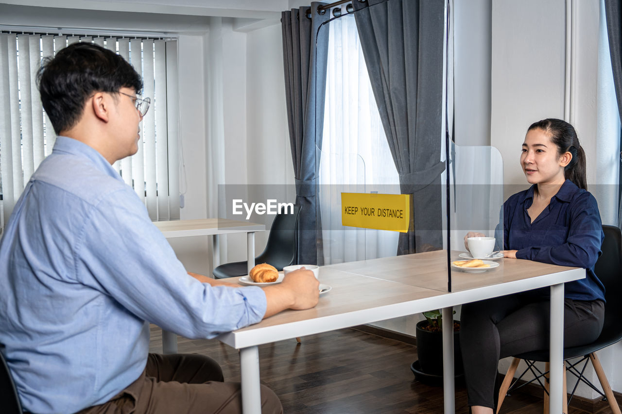 side view of man working in office