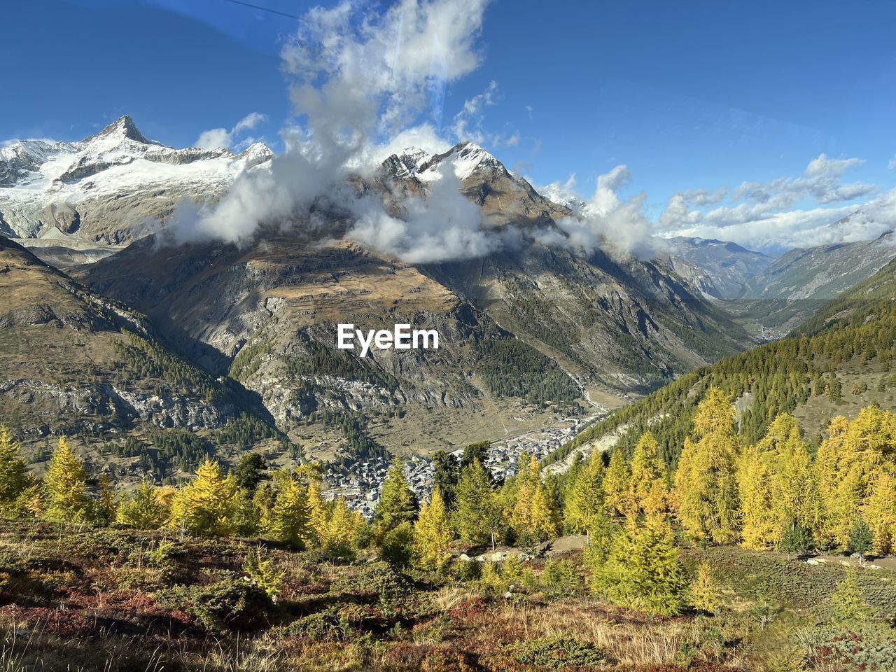 mountain, scenics - nature, environment, landscape, beauty in nature, wilderness, sky, mountain range, nature, land, snow, plant, cold temperature, no people, tree, cloud, winter, travel destinations, snowcapped mountain, ridge, travel, non-urban scene, mountain peak, tranquil scene, plateau, coniferous tree, tranquility, blue, pine tree, pinaceae, day, forest, valley, outdoors, mountain pass, pine woodland, adventure, activity, tourism, rock, physical geography, idyllic