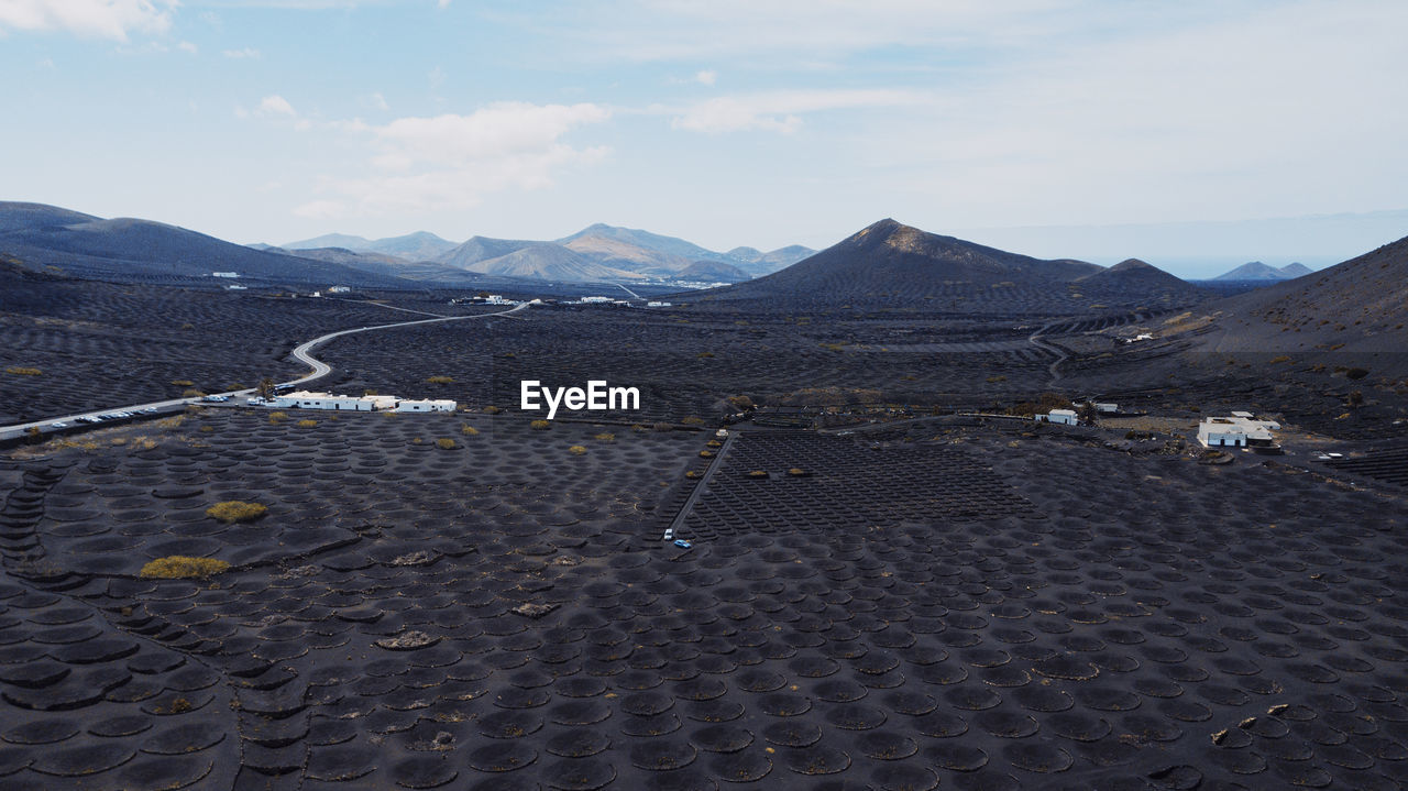 Spain, lanzarote, aerial view of volcanic landscape of bodega la geria vineyard