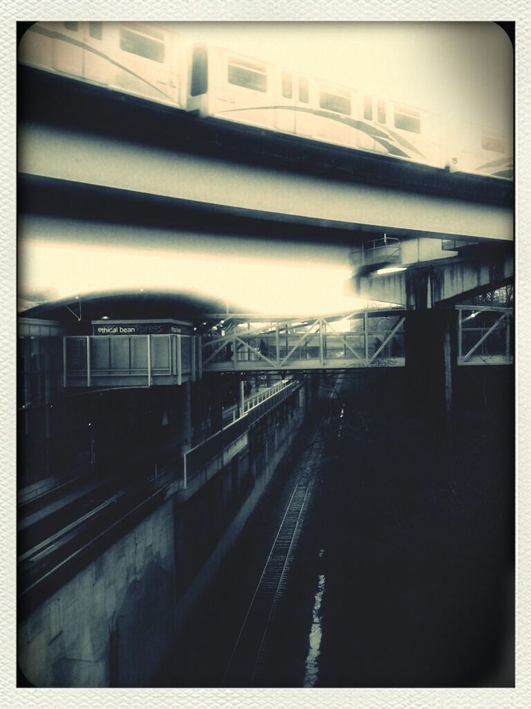 TRAIN ON RAILROAD STATION PLATFORM