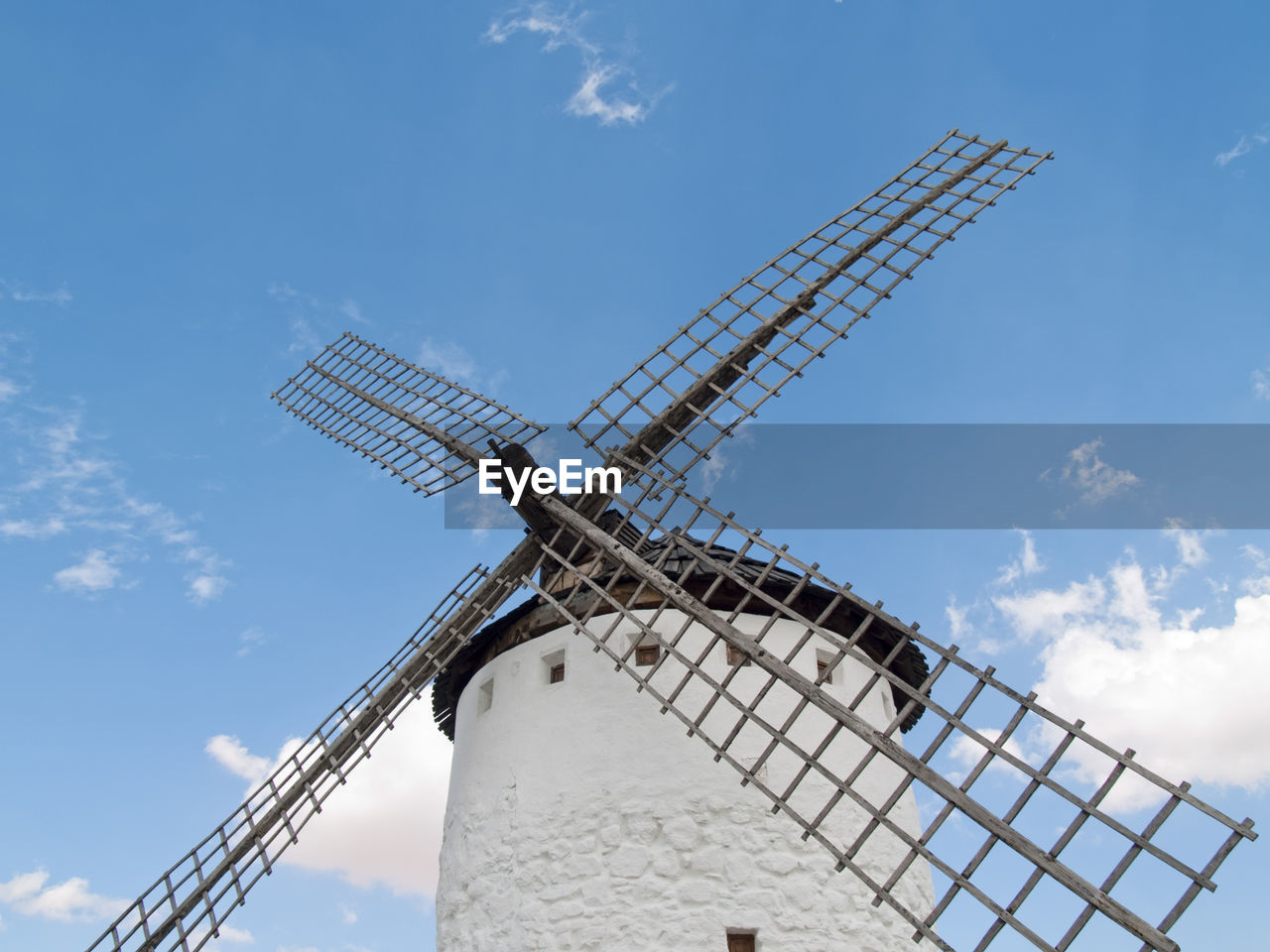 LOW ANGLE VIEW OF TRADITIONAL WINDMILL