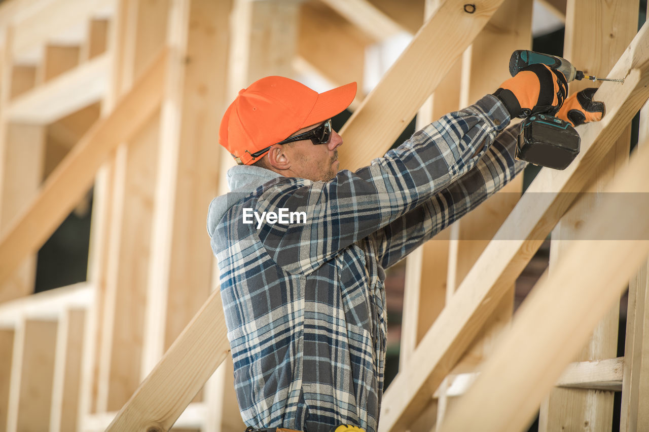 Carpenter working at construction site