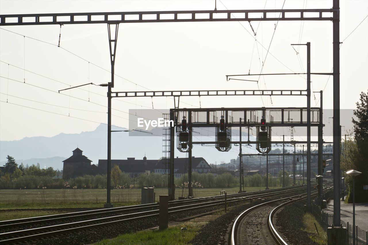 Train on railway tracks against clear sky