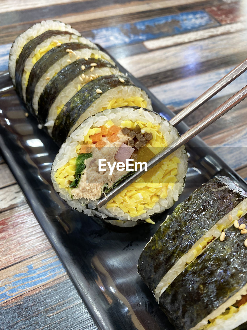 CLOSE-UP OF SUSHI IN TRAY