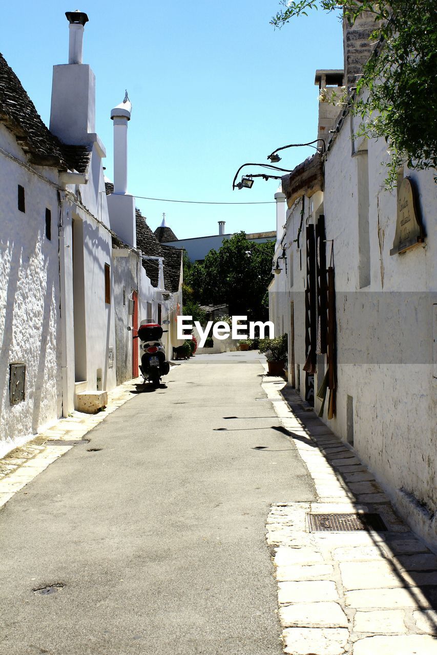 Narrow alley along buildings