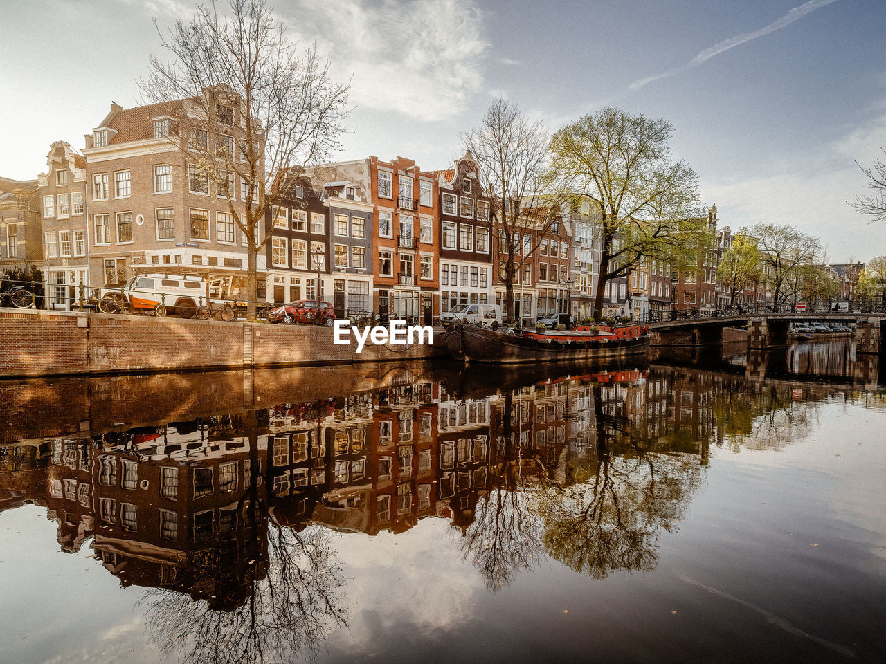 Reflection of old canal houses in the prinsengracht canal in amsterdam