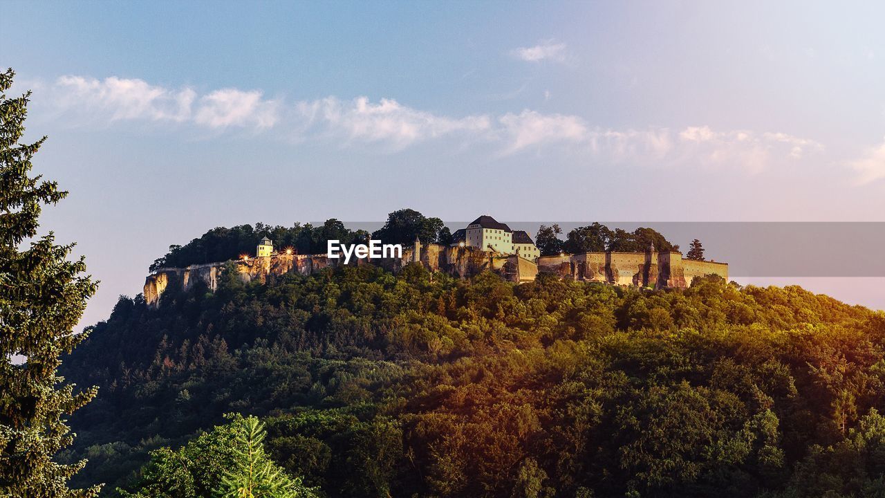 PLANTS GROWING ON FORT AGAINST SKY