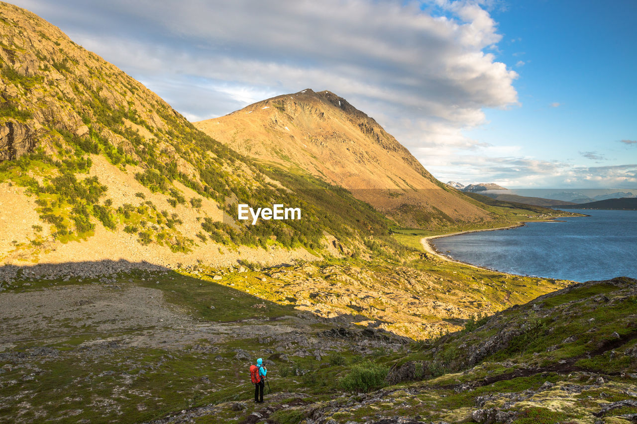 Scenic view of mountains against dramatic sky