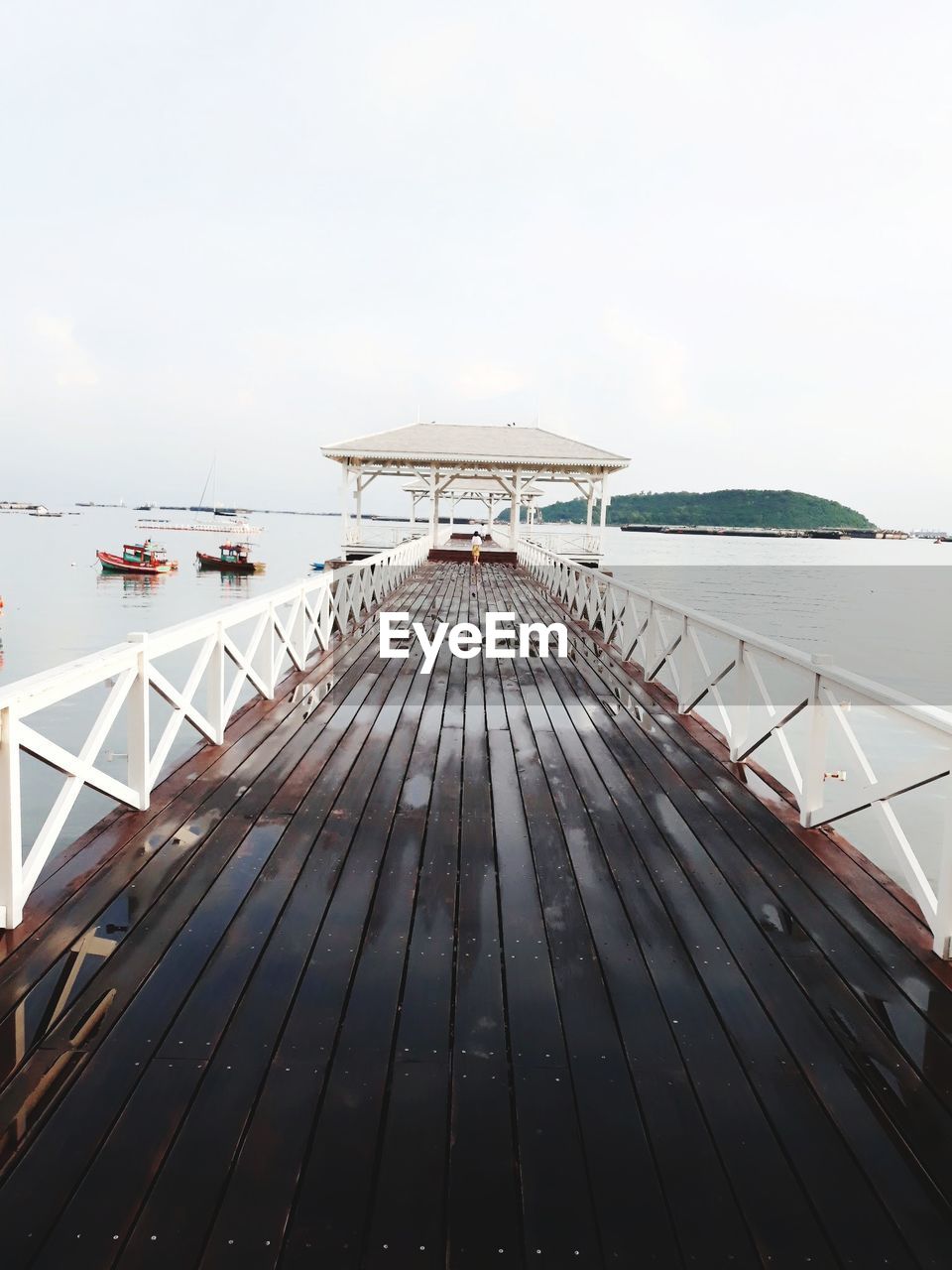 View of pier over sea against sky