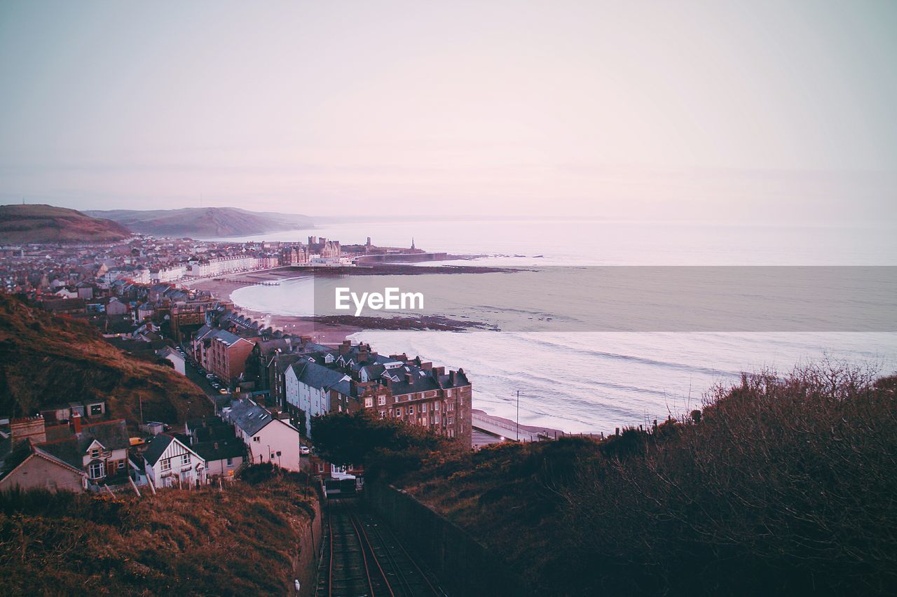 View of cityscape with sea in background