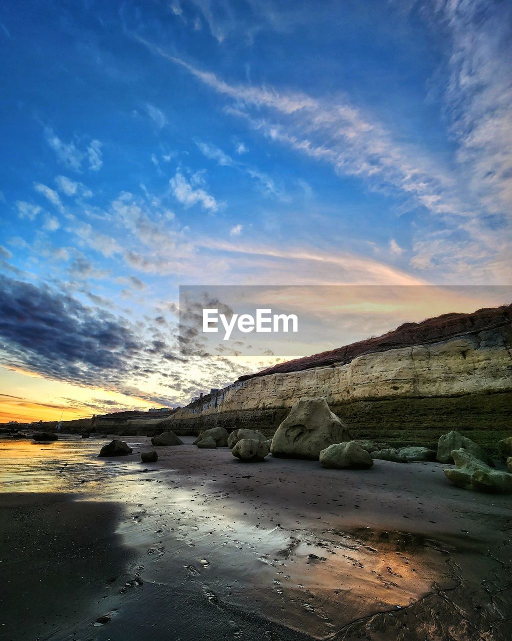 scenic view of landscape against sky during sunset