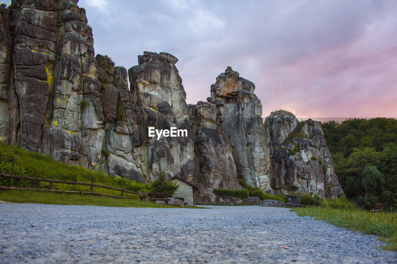 SCENIC VIEW OF ROCKS AGAINST SKY