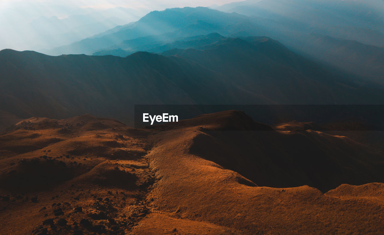 Scenic view of mountain range against sky