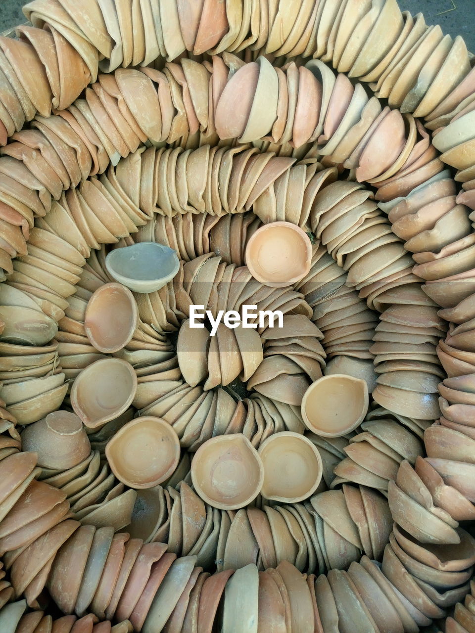 FULL FRAME SHOT OF WOODEN STACK ARRANGED IN CONTAINER