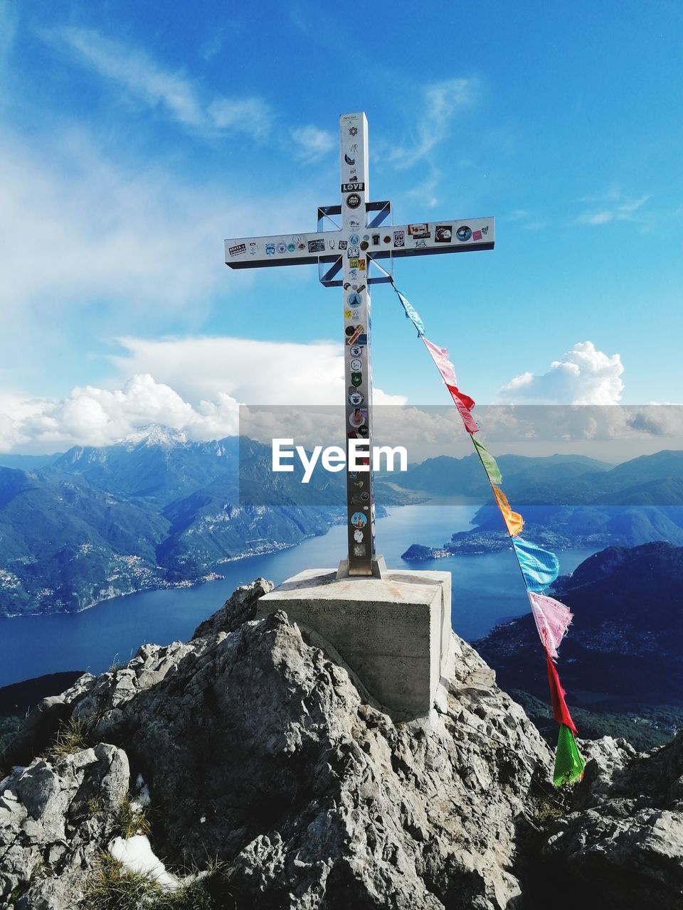 TRADITIONAL WINDMILL ON ROCK AGAINST SKY