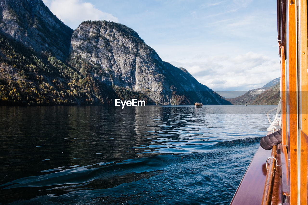 Scenic view of lake königssee with mountains against sky.