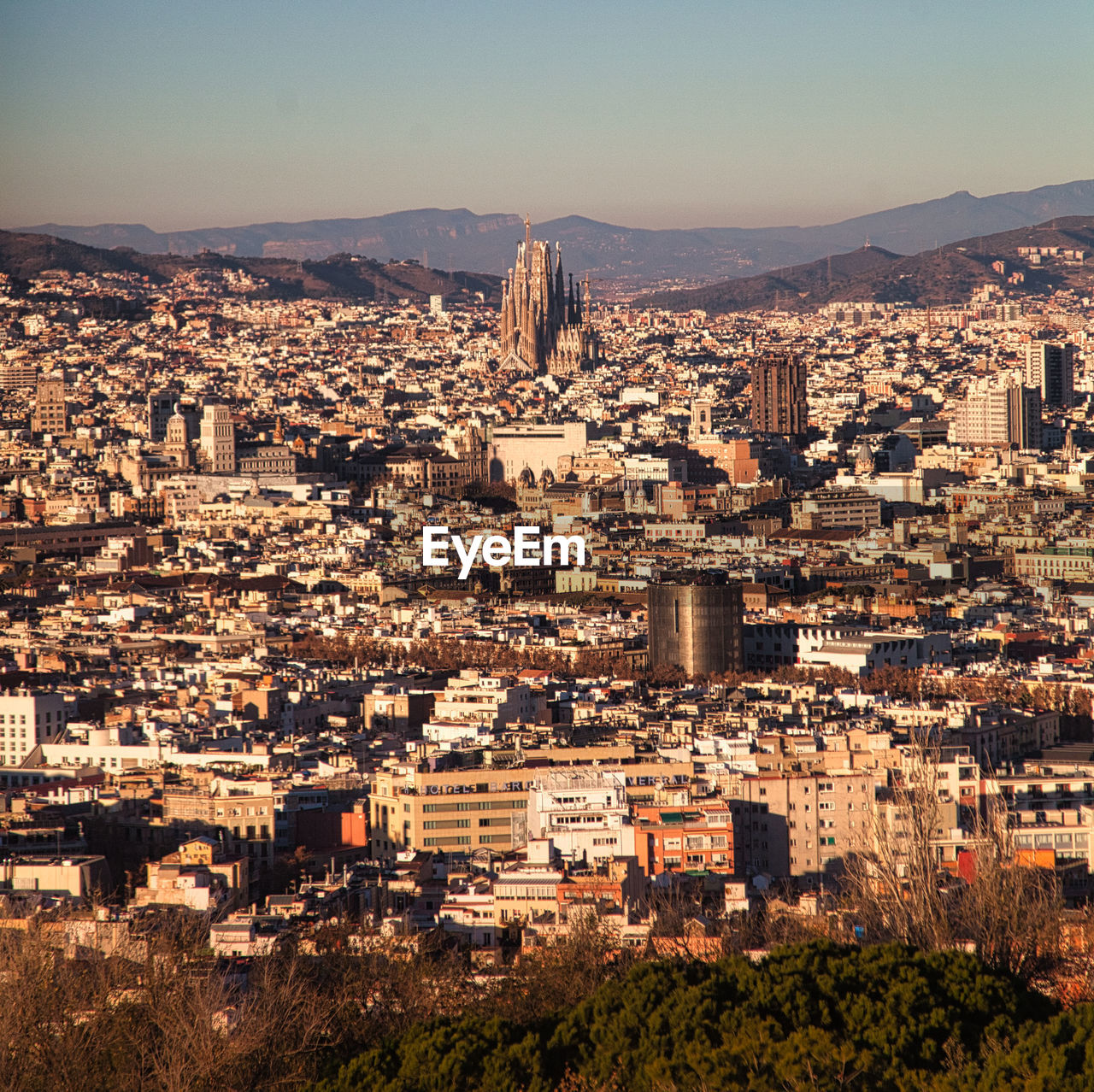 architecture, city, building exterior, built structure, cityscape, building, town, residential district, skyline, urban area, aerial photography, horizon, sky, high angle view, nature, crowd, crowded, travel destinations, landscape, travel, neighbourhood, outdoors, house, residential area, mountain, city life, community, urban skyline, sunlight, evening, clear sky, tourism, aerial view, downtown, roof, bird's-eye view, environment, office building exterior, dusk