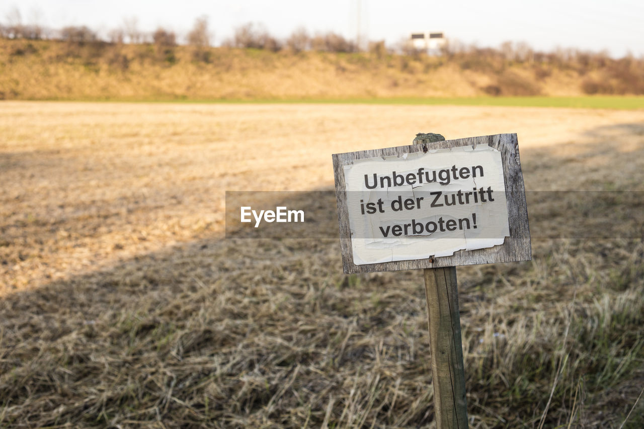 Warning sign on field