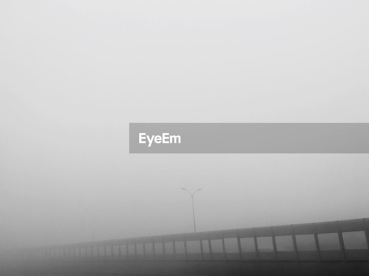 TRADITIONAL WINDMILL IN FOGGY WEATHER