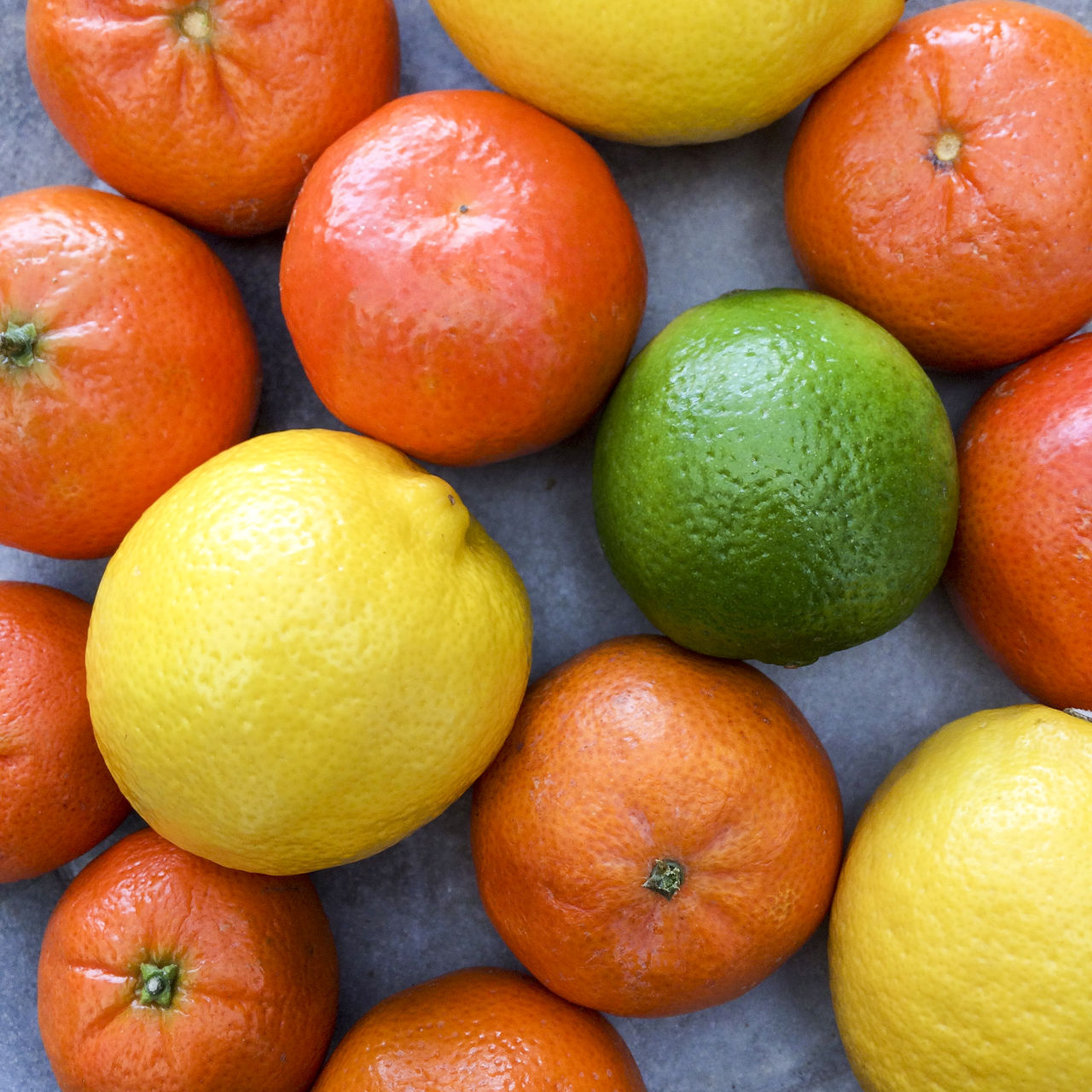 Directly above shot of various citrus fruits on table