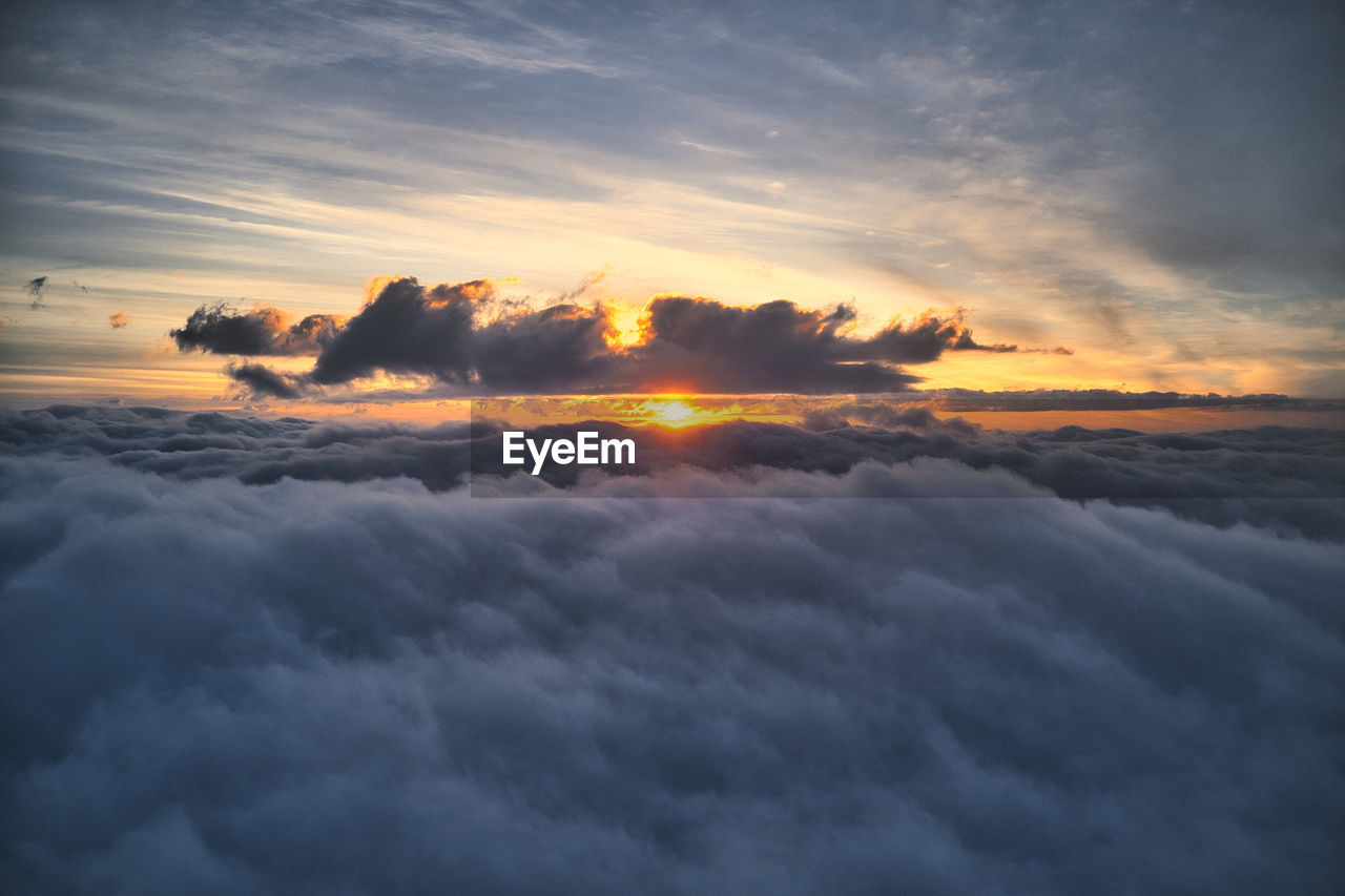 Low angle view of dramatic sky during sunset