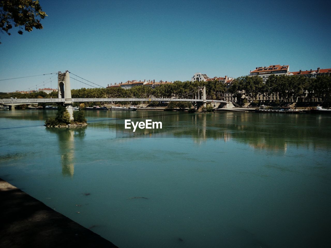 SCENIC VIEW OF BRIDGE AGAINST CLEAR SKY