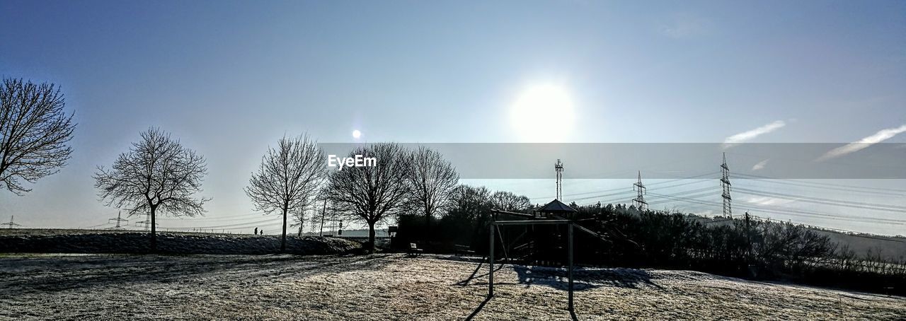 PANORAMIC VIEW OF SUN SHINING ON SKY