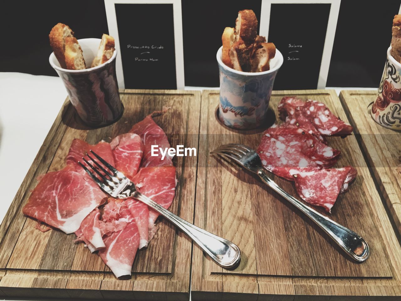 High angle view of beef with bread served on table