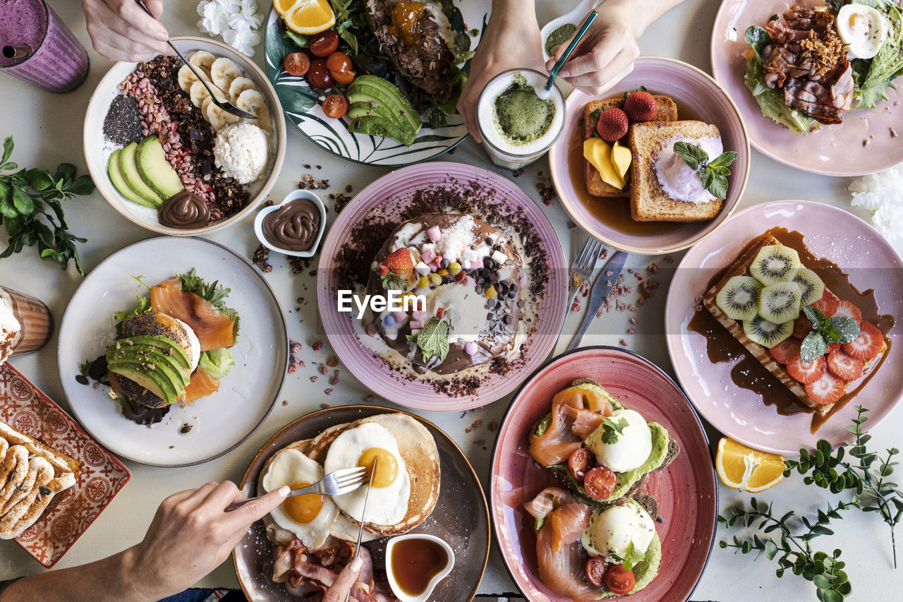 Brunch choice crowd food concept. family breakfast or brunch served on a table. aerial view.