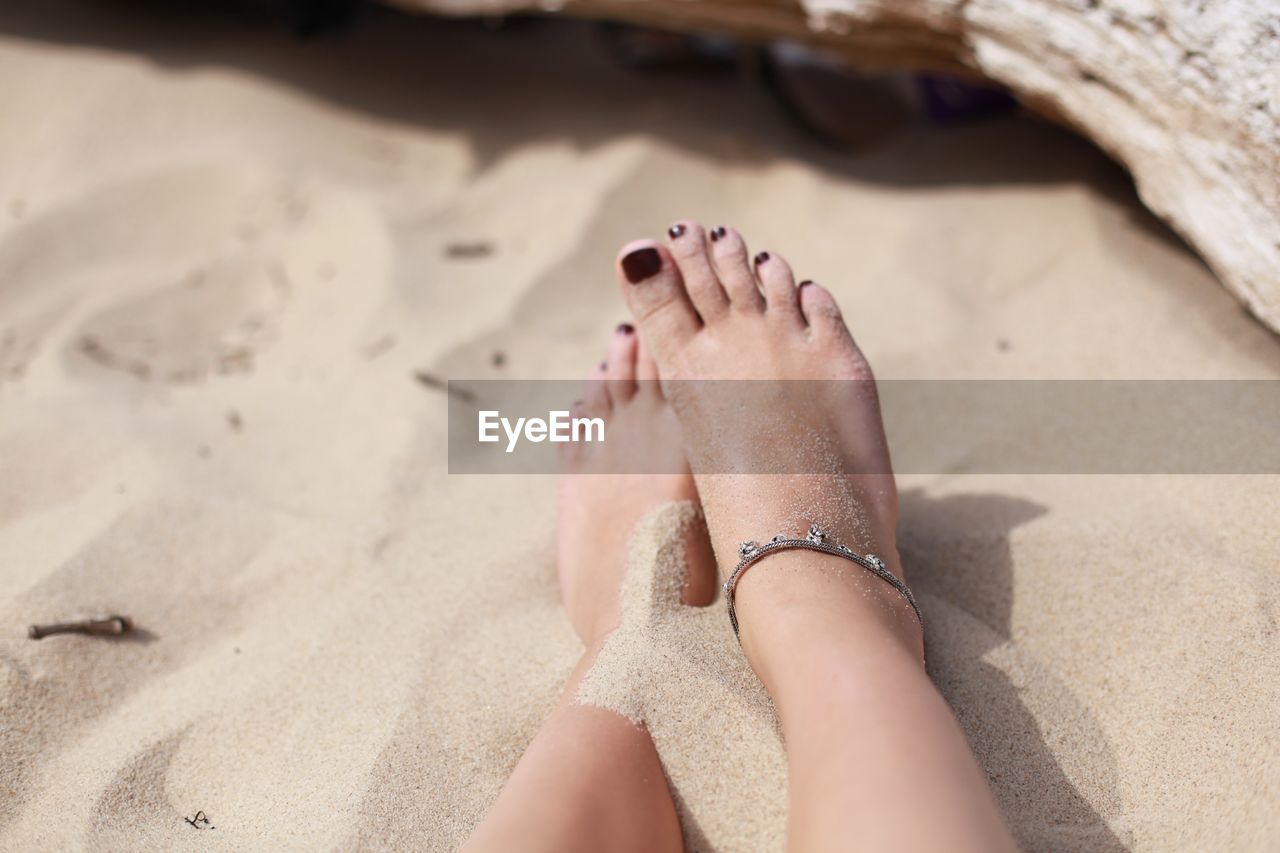 A woman on sand at beach