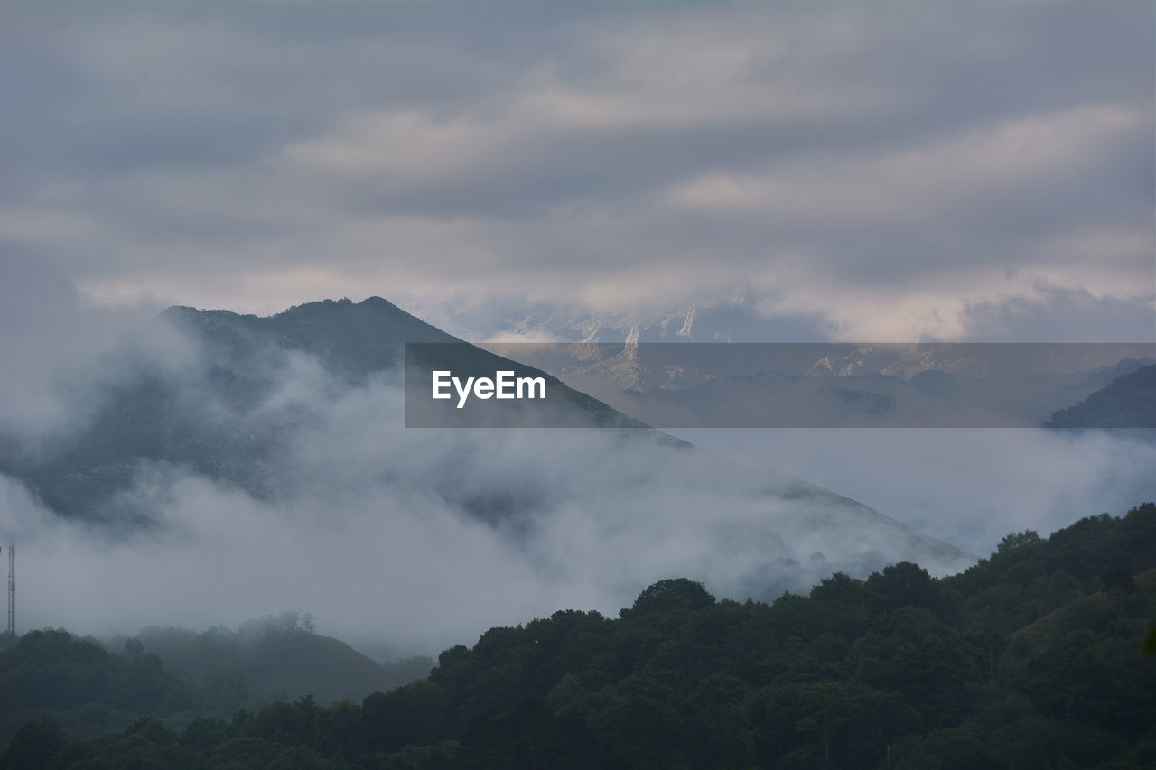 High mountains full of fog and clouds, colors of nature