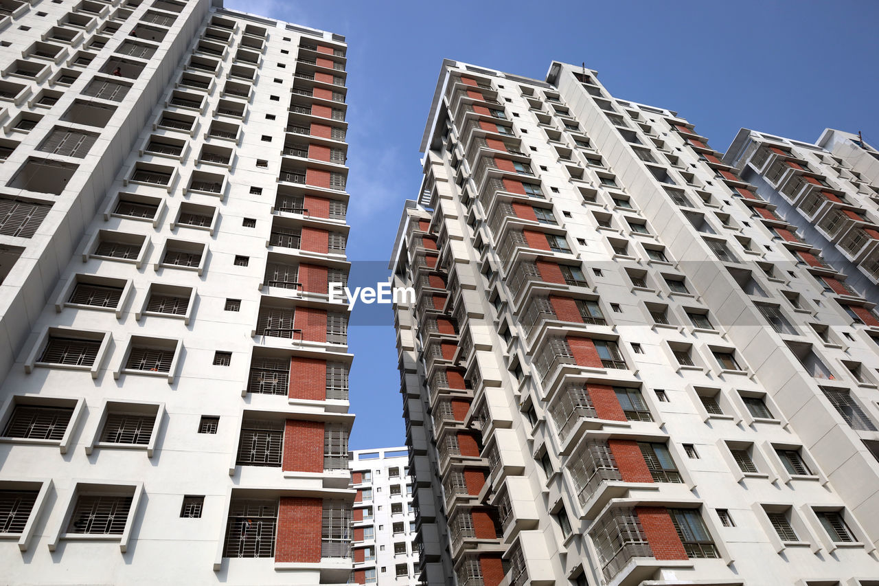 Low angle view of modern building against clear sky