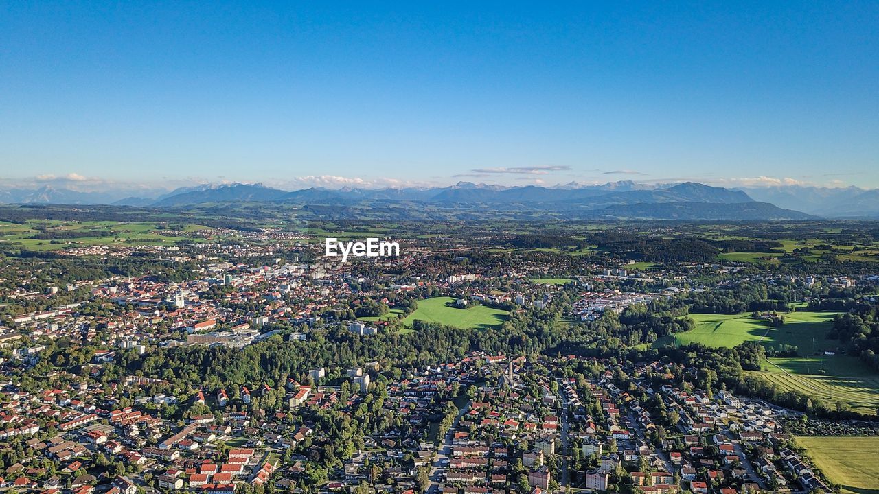HIGH ANGLE SHOT OF TOWNSCAPE AGAINST CLEAR SKY