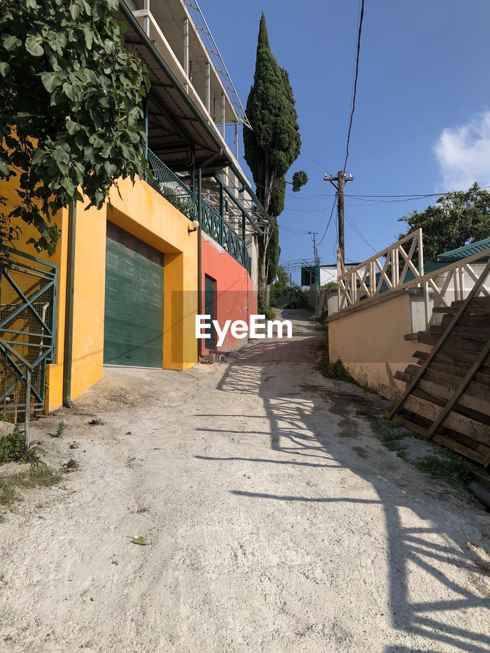 FOOTPATH BY BUILDING AGAINST SKY