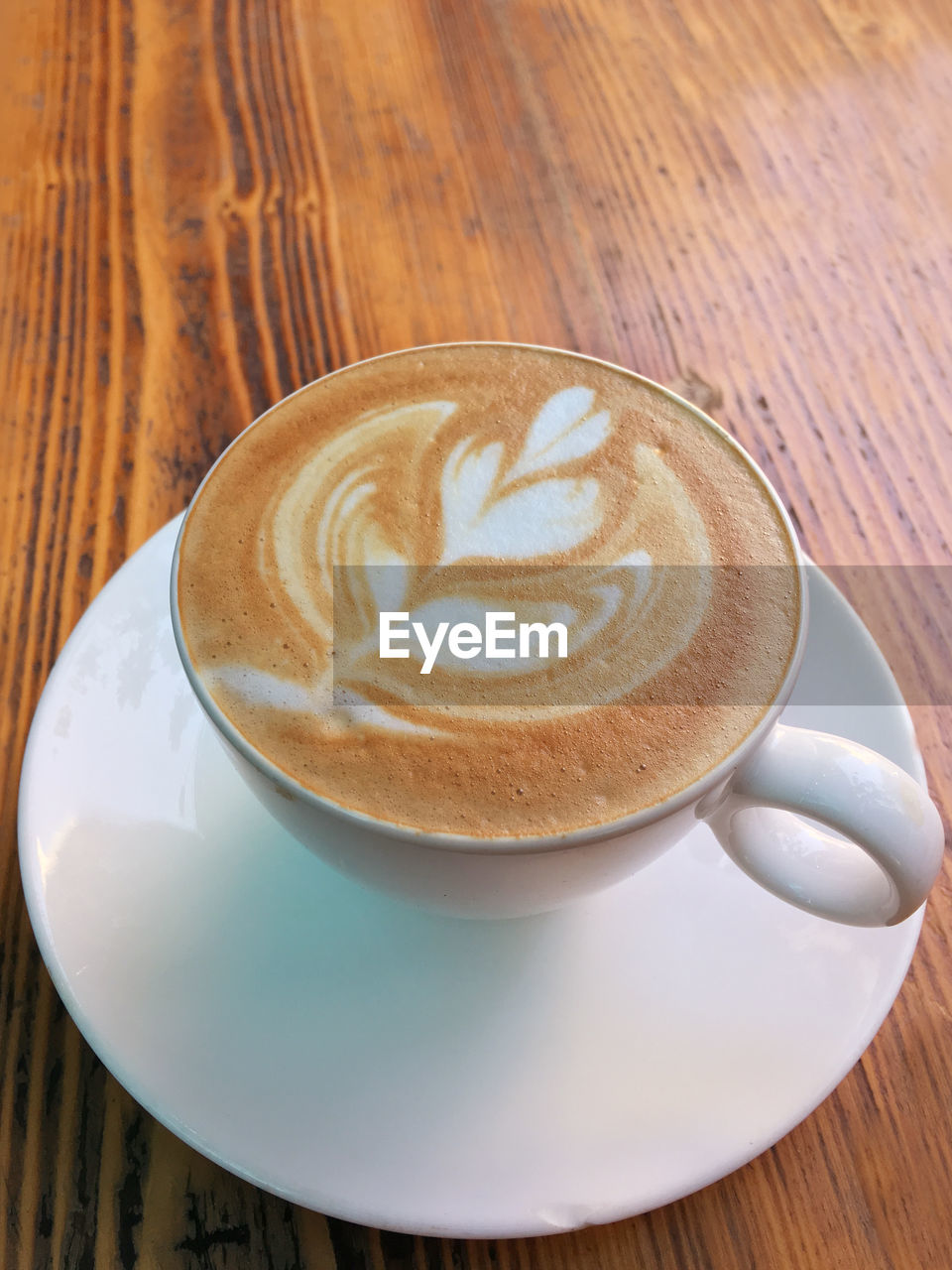 CLOSE-UP OF COFFEE ON TABLE